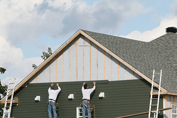 Professional Siding technician working in Conesville, OH